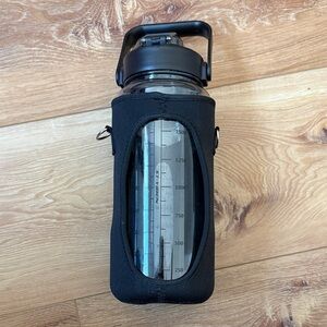 70oz Black Insulated Plastic Water Bottle with Sleeve